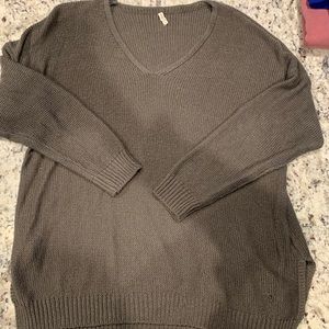 Boutique brown oversized sweater with a couple of small snags